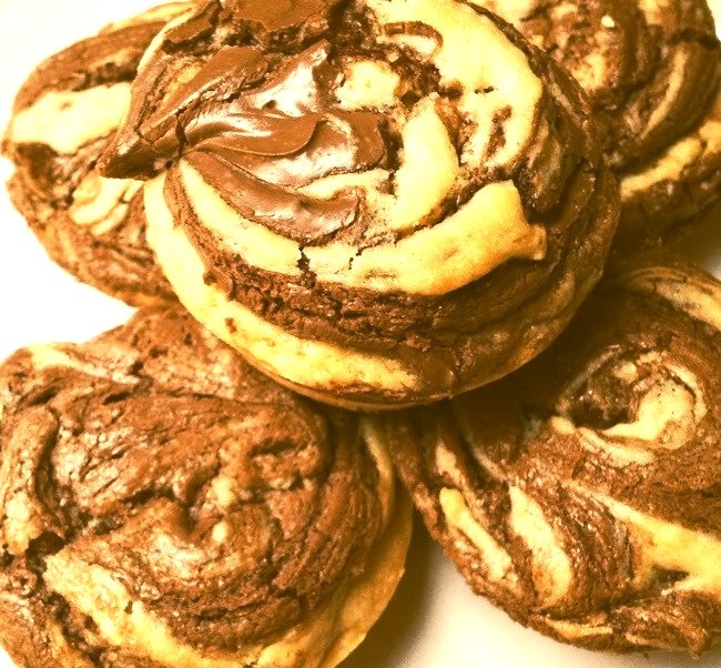 Nutella swirl cupcakesFind recipe here https://theginger-snap.blogspot.co.uk/2013/09/nutella-swirl-cupcakes.html